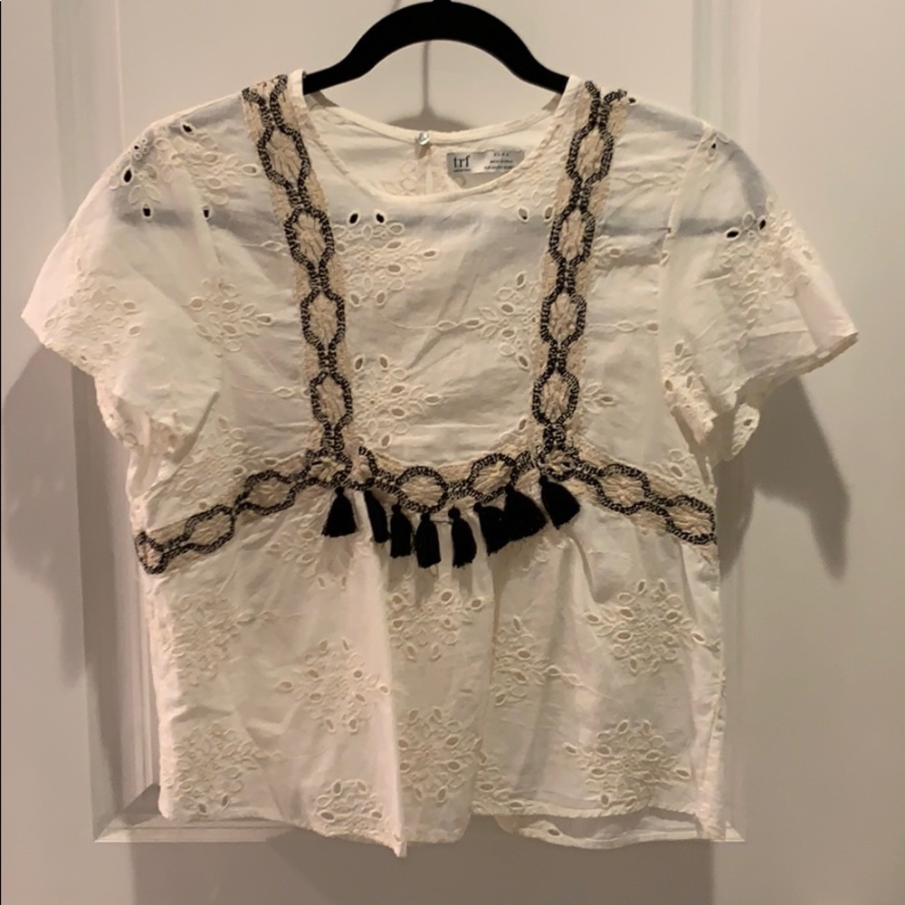 Embroidered cream eyelet top